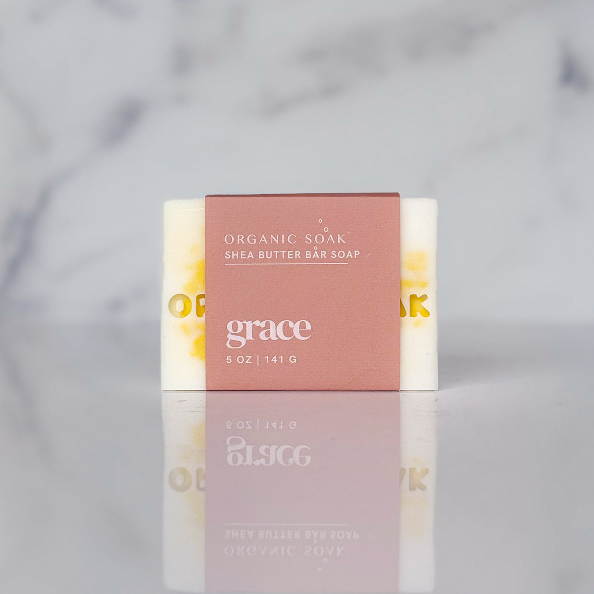 grace shea butter bar soap against a marble background