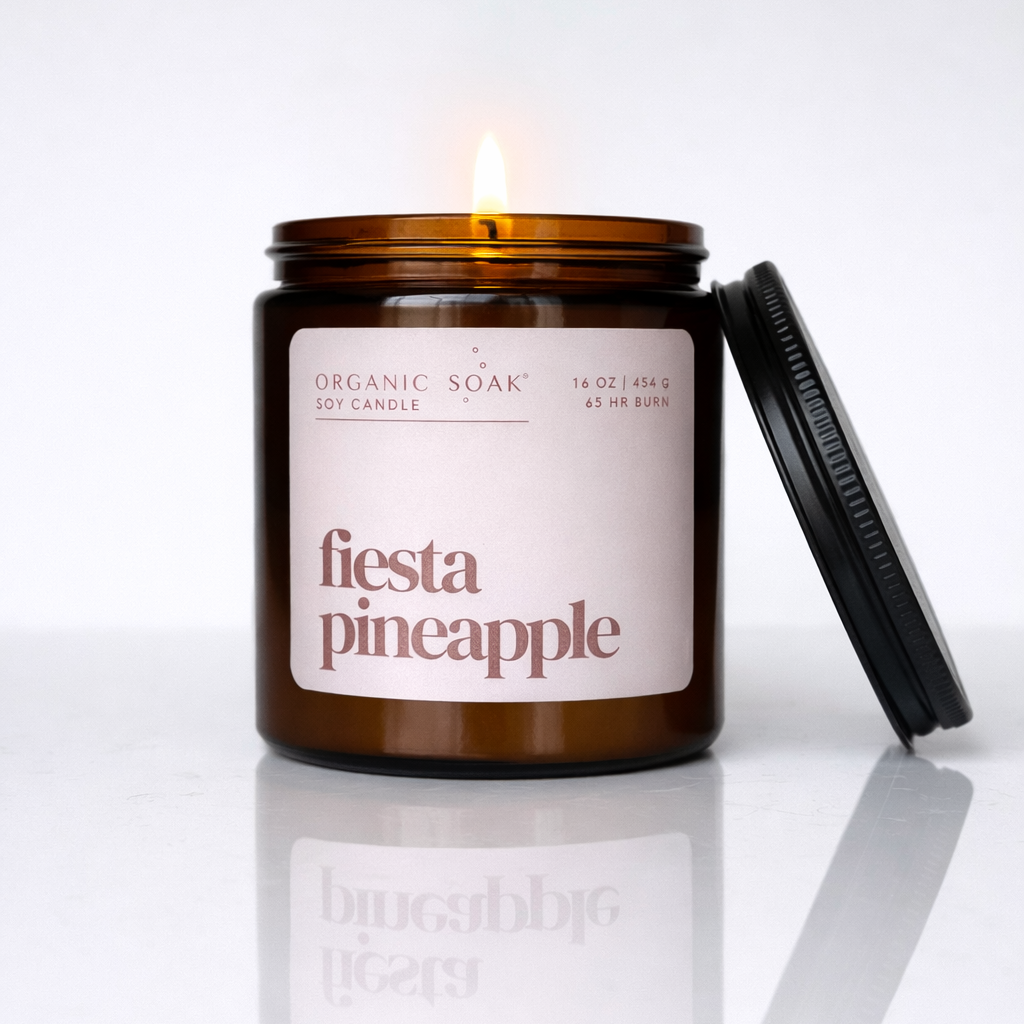 Candle in a jar labeled &