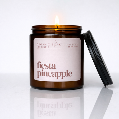 Candle in a jar labeled &