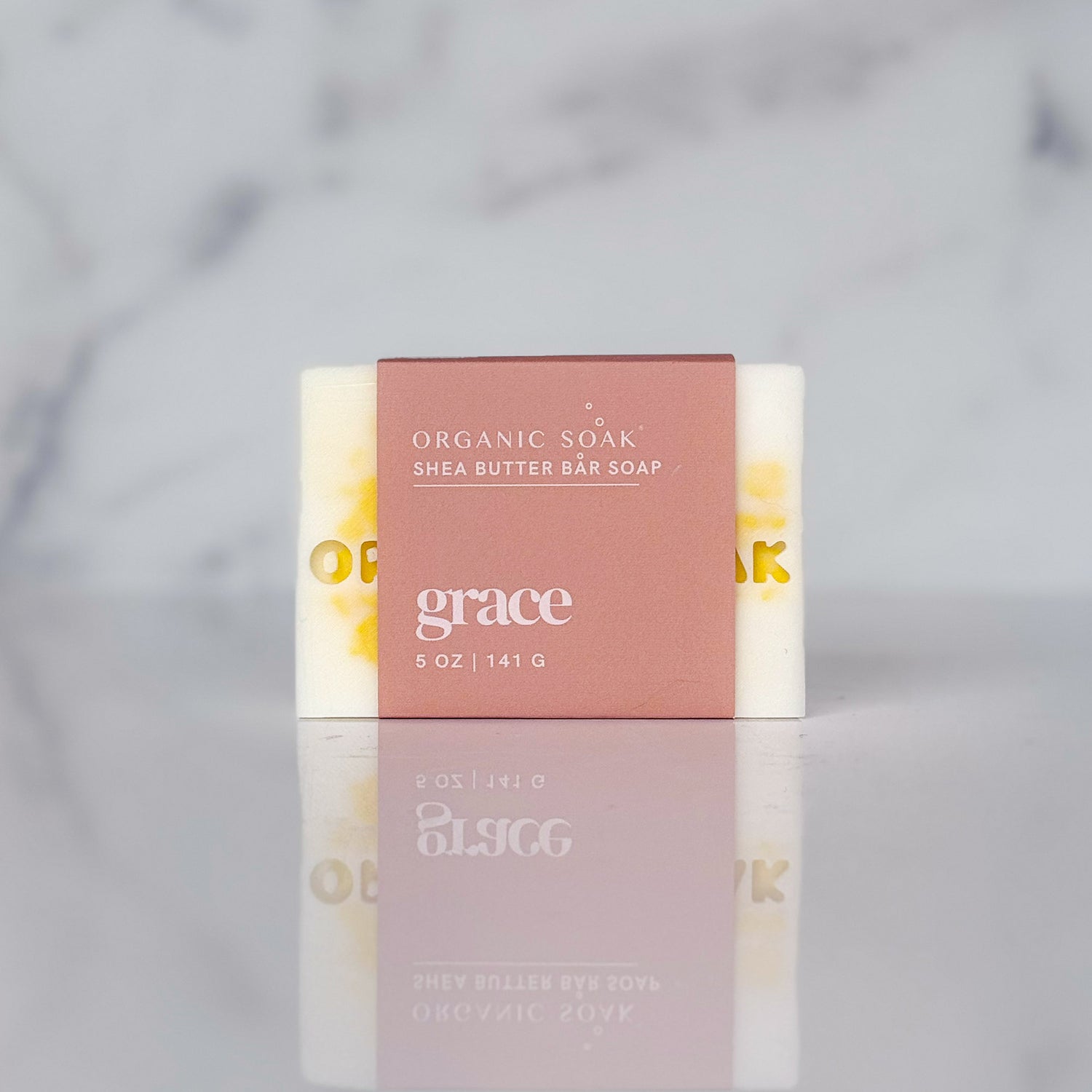 grace shea butter bar soap against a marble background