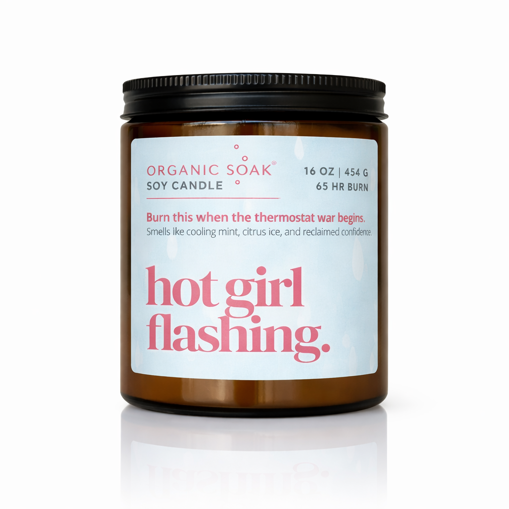 Candle with a label reading &