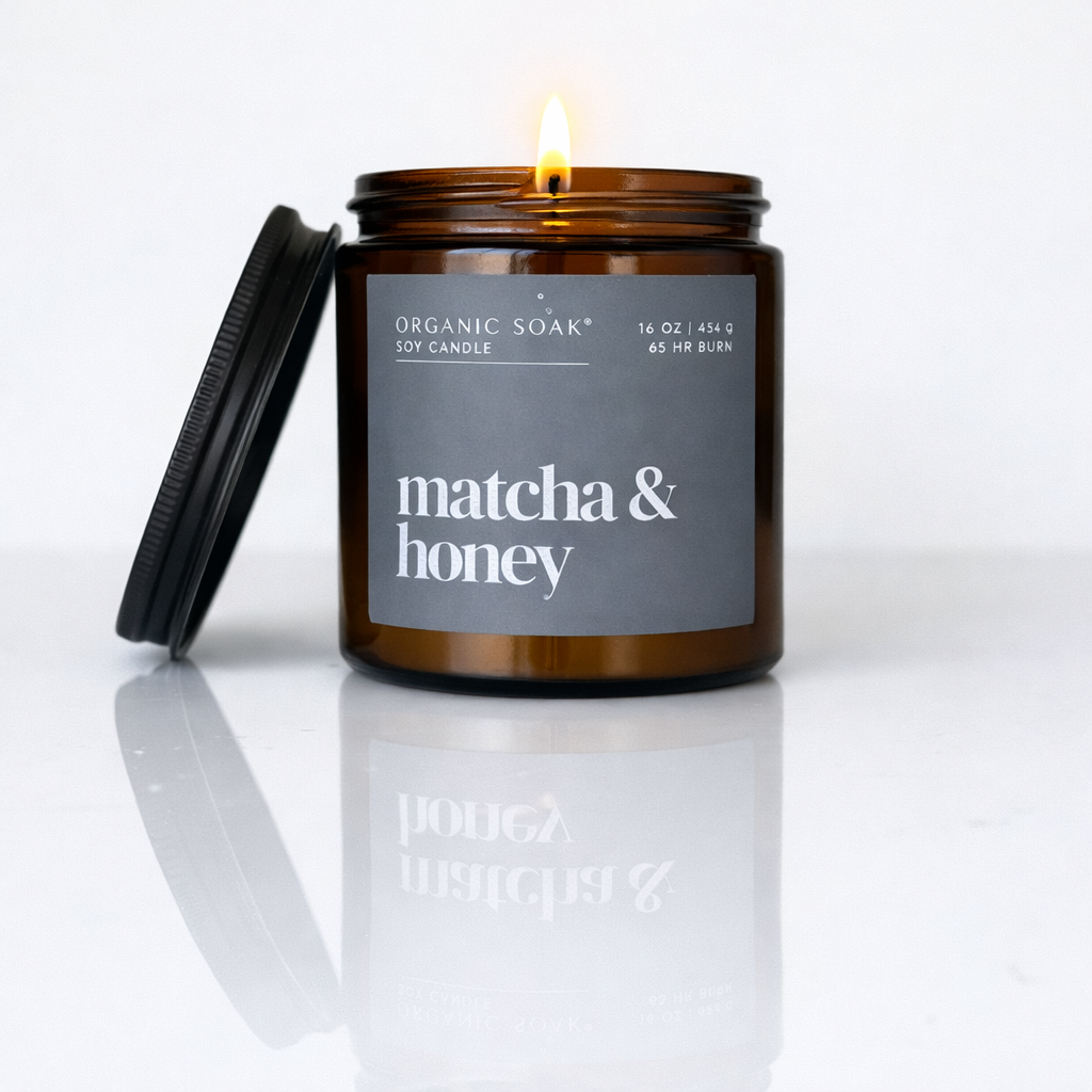 Matcha &amp; Honey candle with a green label on a white background