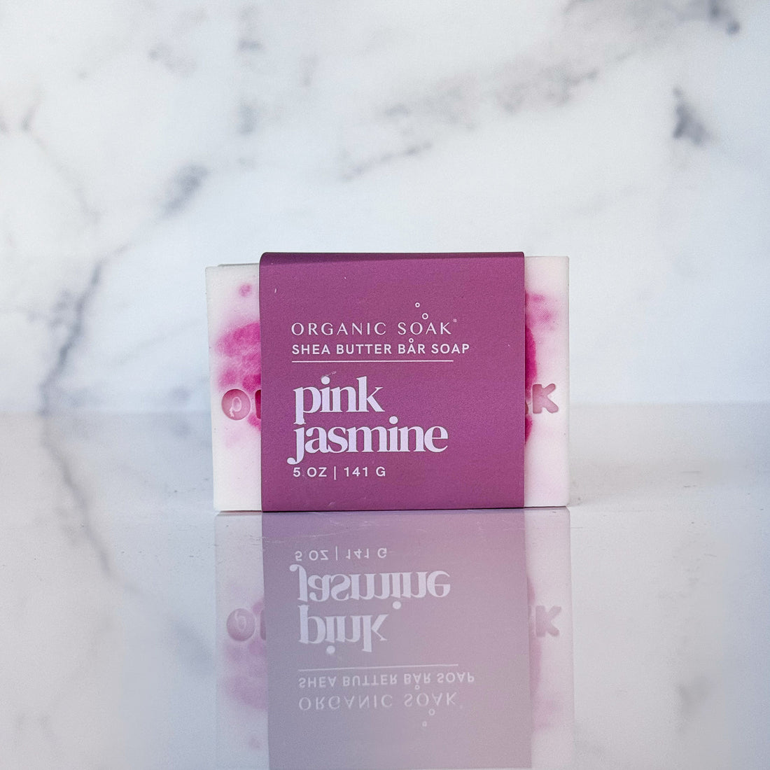 pink jasmine shea bar soap against a marble background